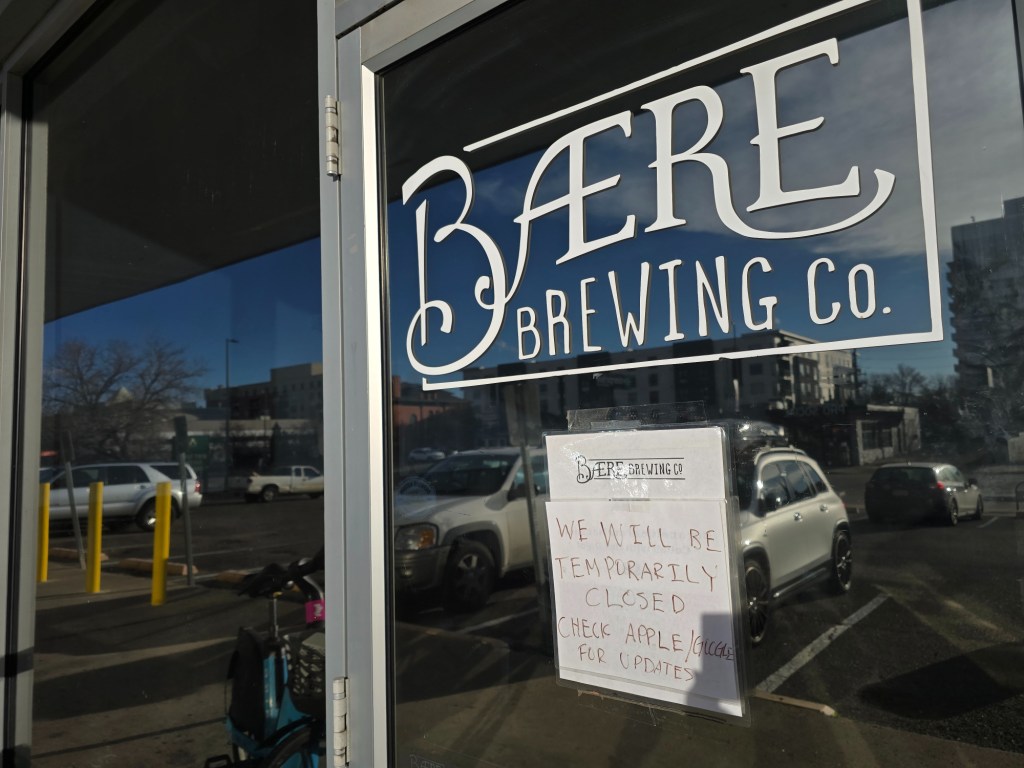 temporarily closed sign on a brewery