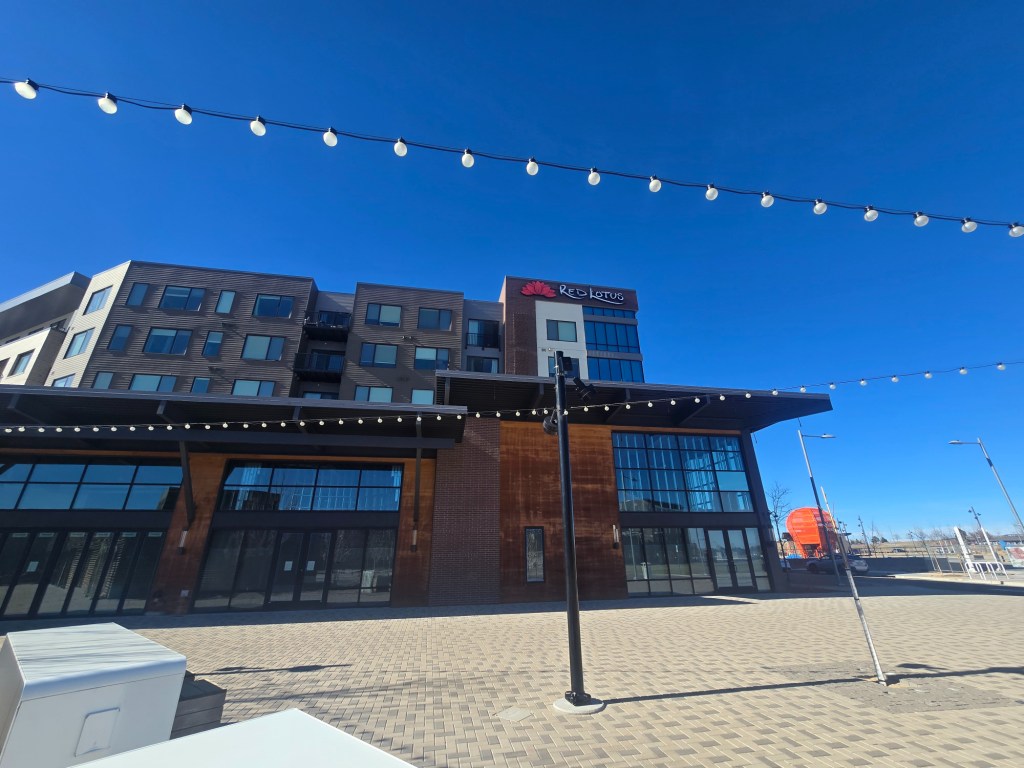 exterior of building with "red Lotus" sign