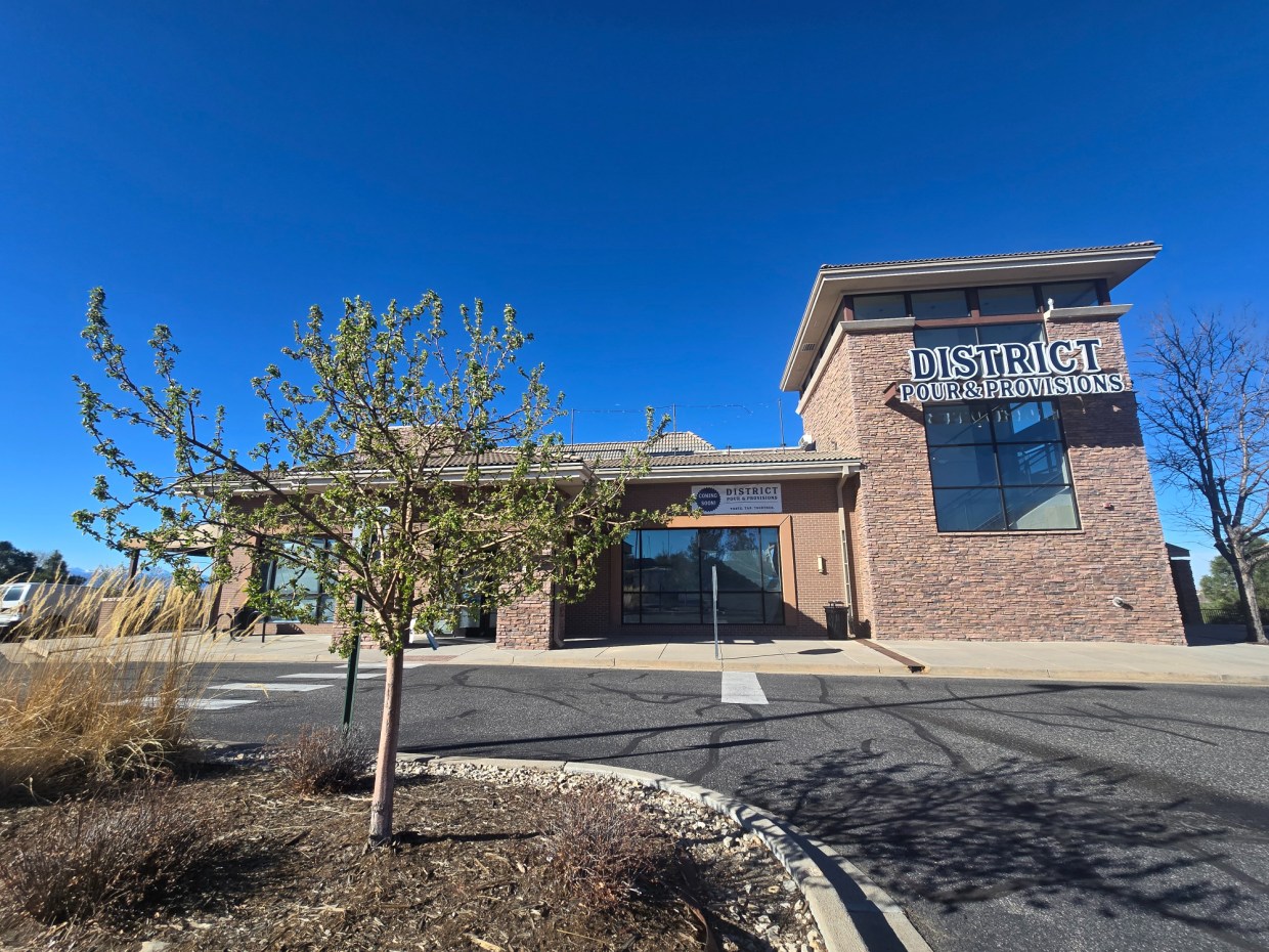 exterior of building with "District" sign