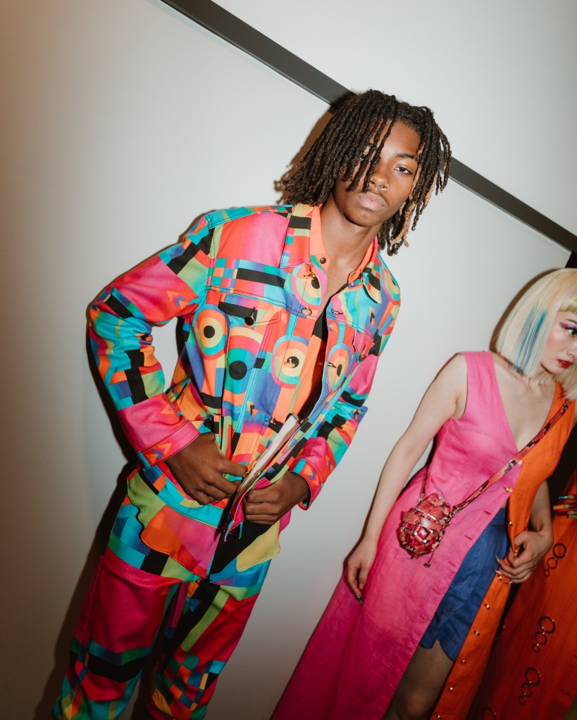 A model in a colorful suit