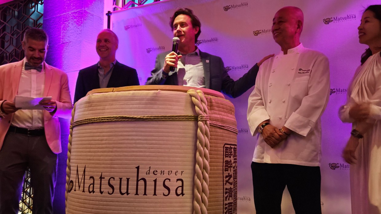 five people on a stage