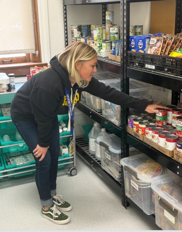 women looking at stocked shelves