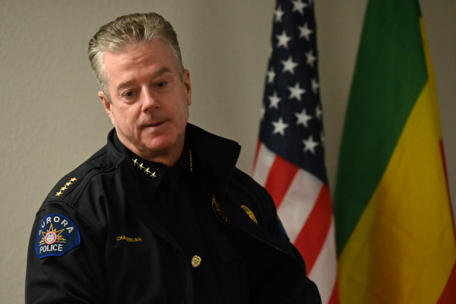 Aurora Police Chief Todd Chamberlain meets with residents at community center.