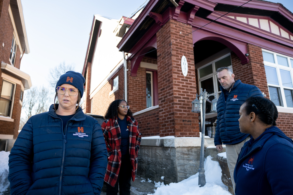 A fentanyl emergency response team stands outside of a home in Ohio.