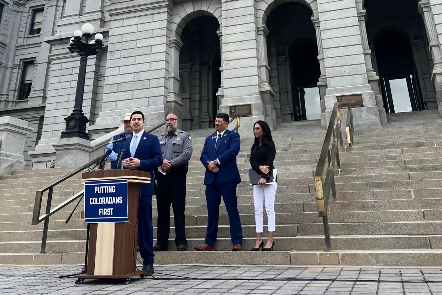 Republican U.S. representatives Gabe Evans and Lauren Boebert hold a press conference on the steps of the Colorado State Capiotl.
