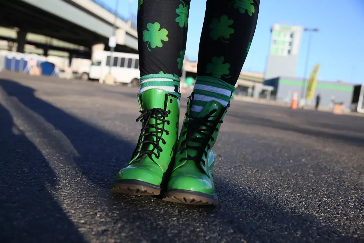 woman in green boots and shamrock tights