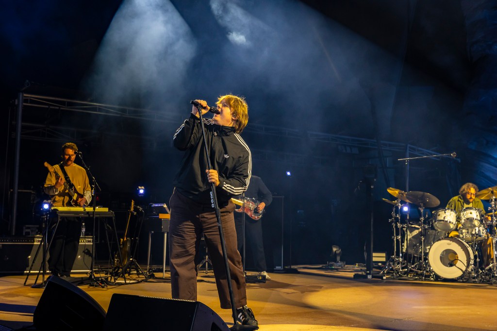 A photo of Lewis Capaldi performing on stage at Red Rocks.