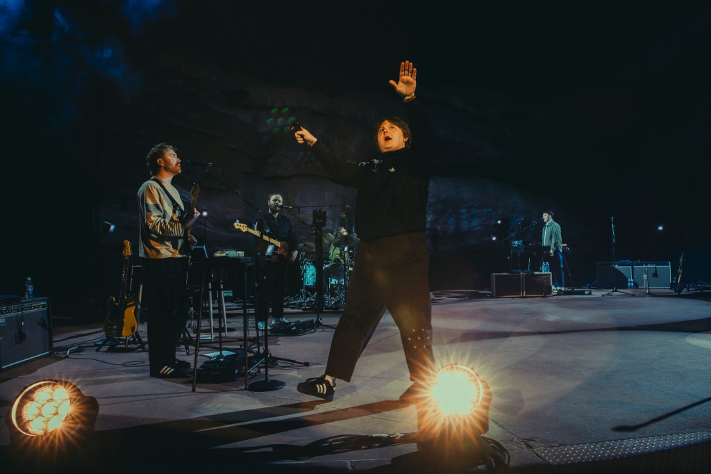 A photo of Lewis Capaldi performing on stage at Red Rocks.