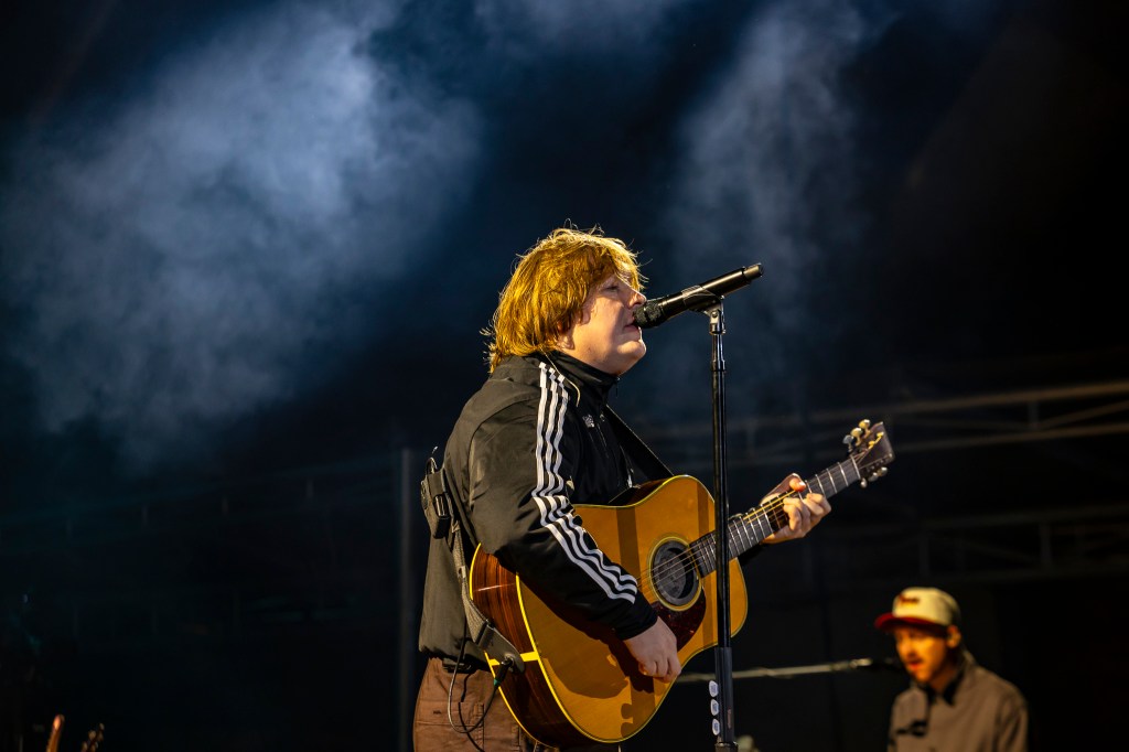 A photo of Lewis Capaldi performing on stage at Red Rocks.