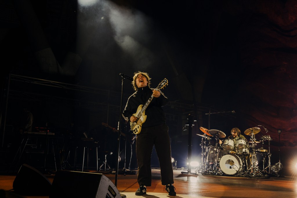 A photo of Lewis Capaldi performing on stage at Red Rocks.