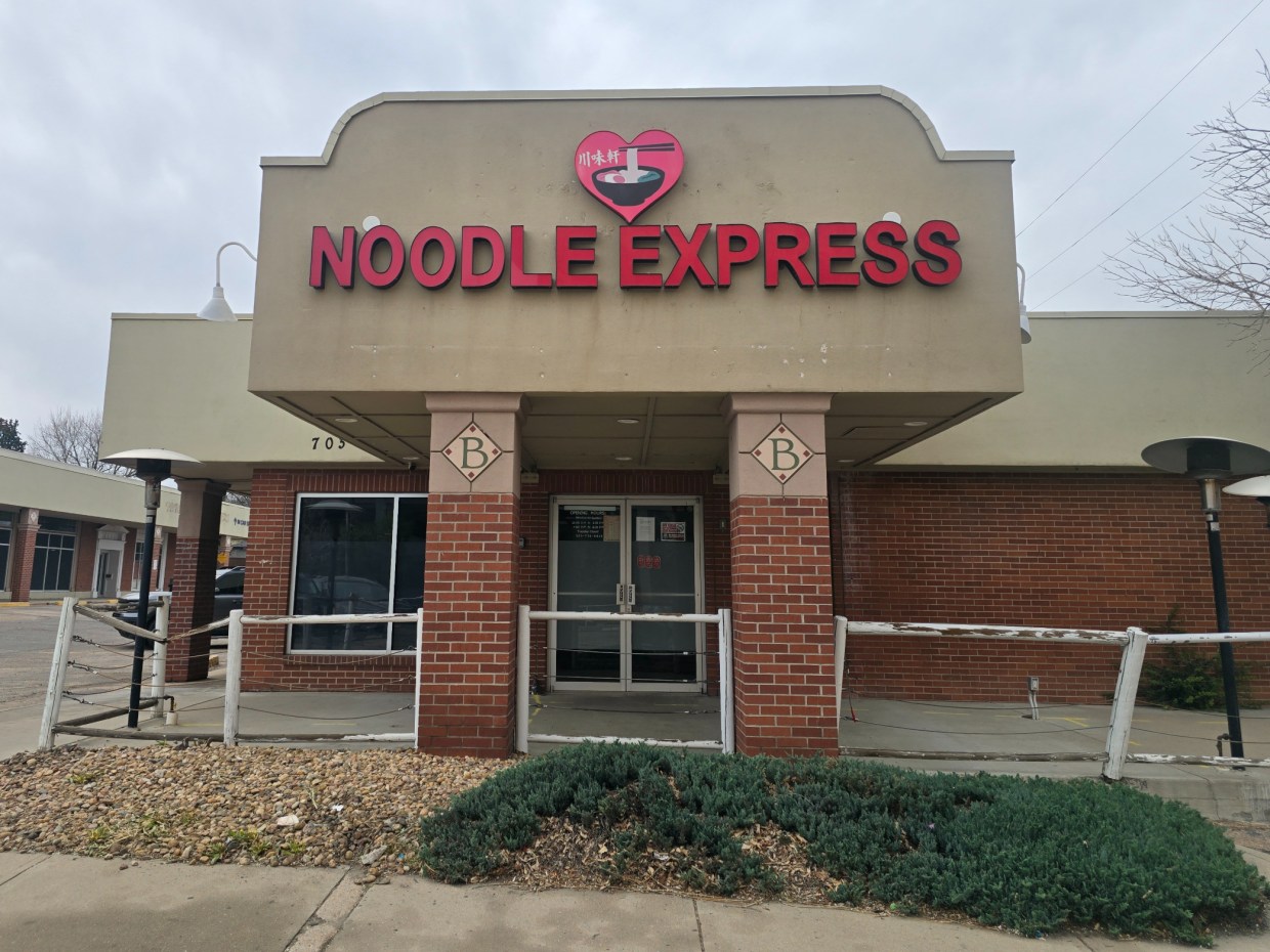 building with a "Noodle Express" sign