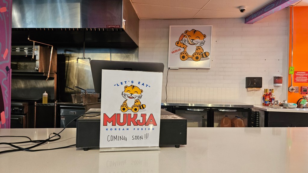 counter with a "Mukja coming soon" si