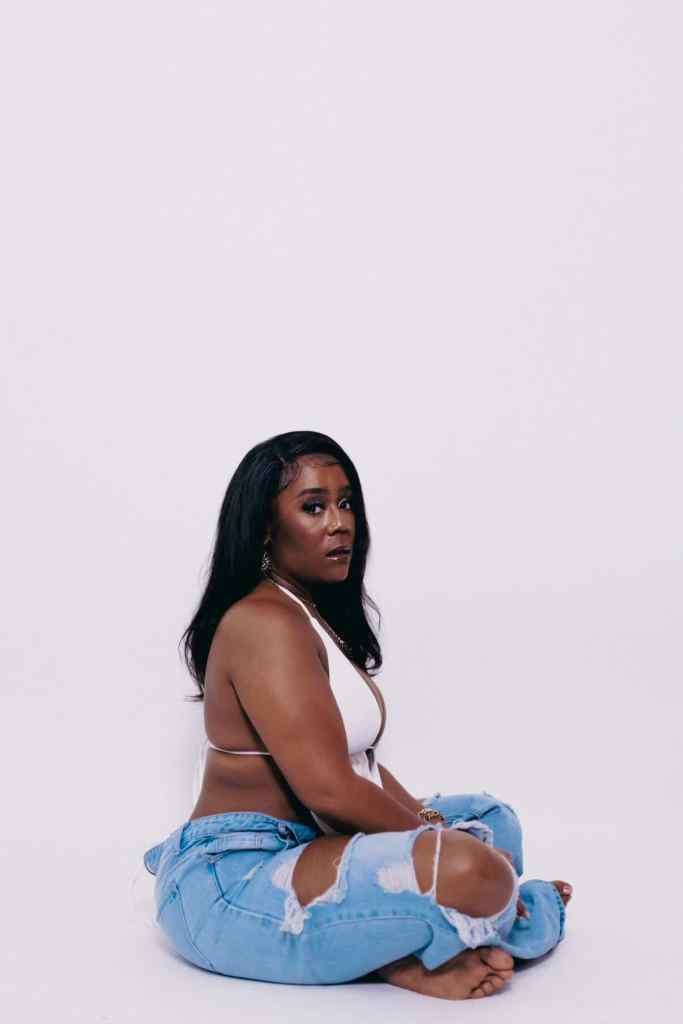 woman sitting with legs crossed