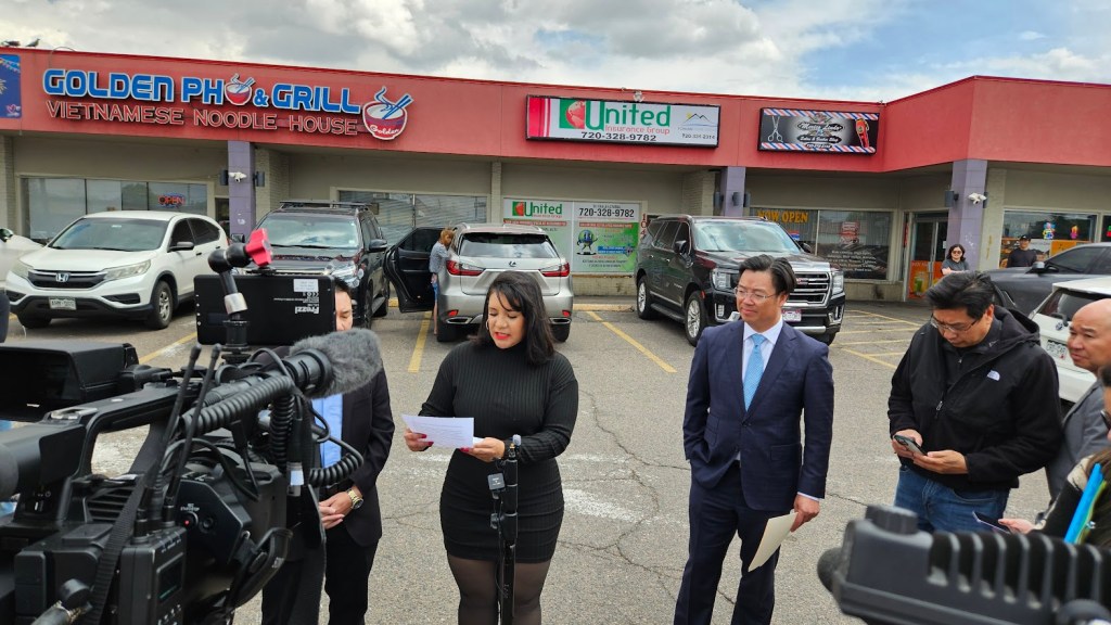 a press conference in a parking lot