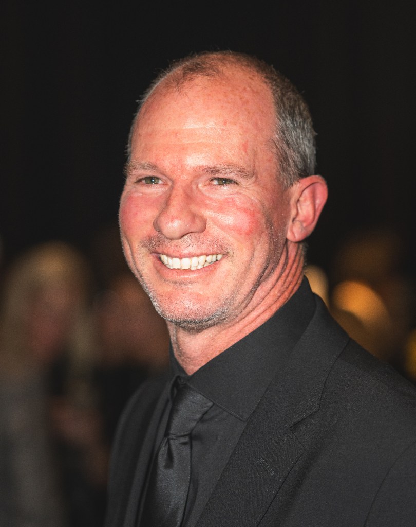 portrait of a man in a black suit