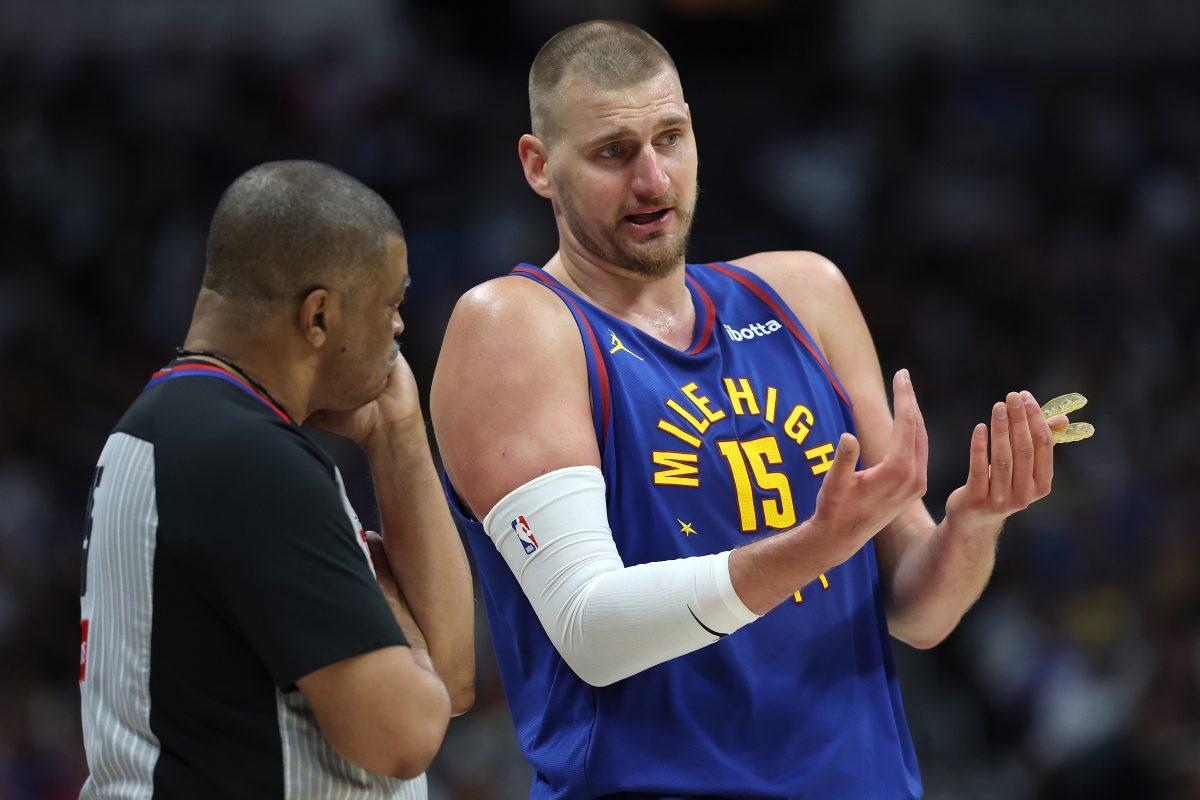 Nuggets center Nikola Jokic argues a call with referee Tony Brothers during game two against the timberwolves
