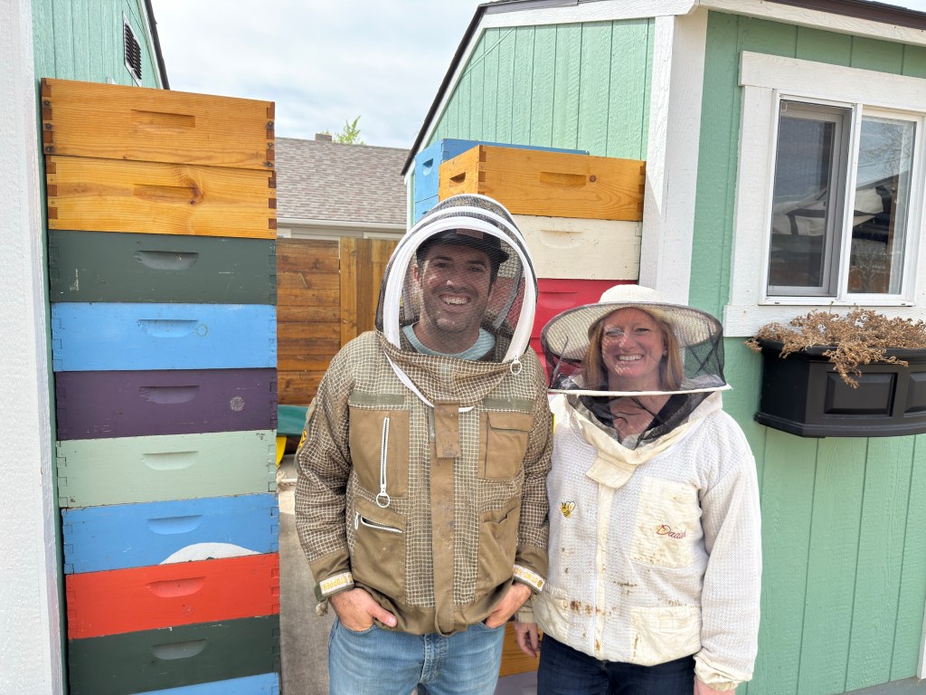 a couple in bee gear