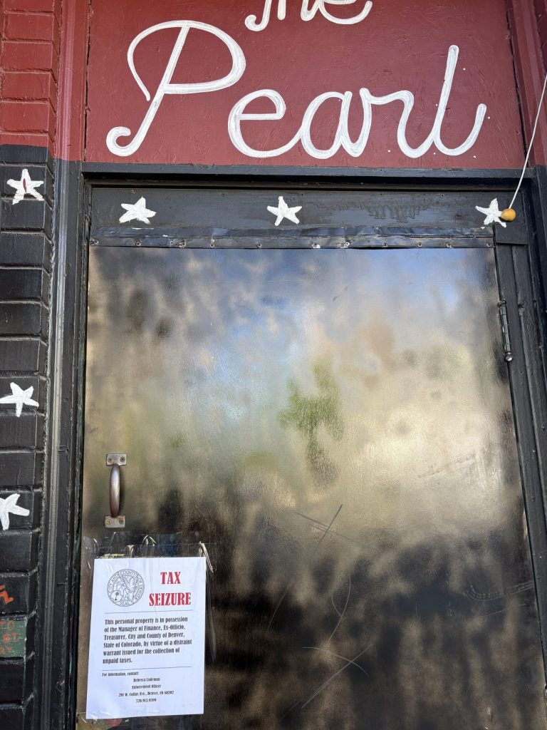 a tax notice on the door of The Pearl