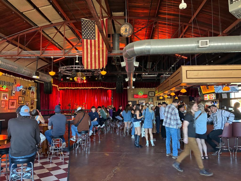 Dance hall fille dwith people