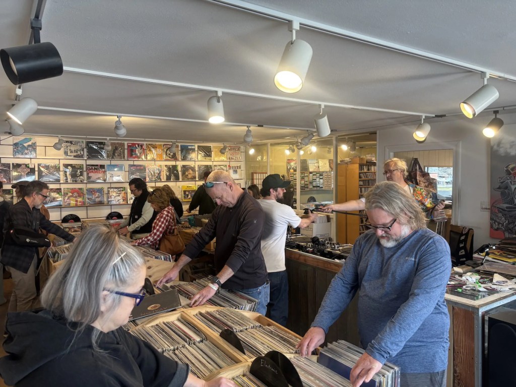 People looking through records