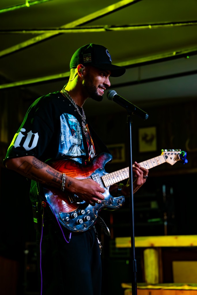 singer with guitar