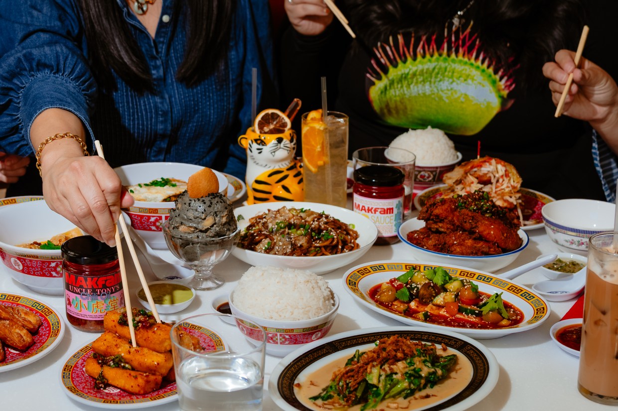People using chopsticks to dine on Chinese dishes from MAKfam