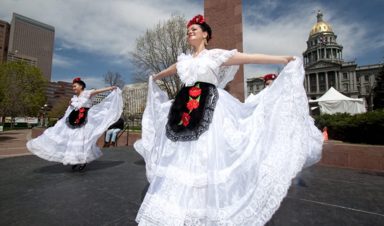 A folklórico dancer performs at Civic Center Park as part of Denver Cinco de Mayo Festival.