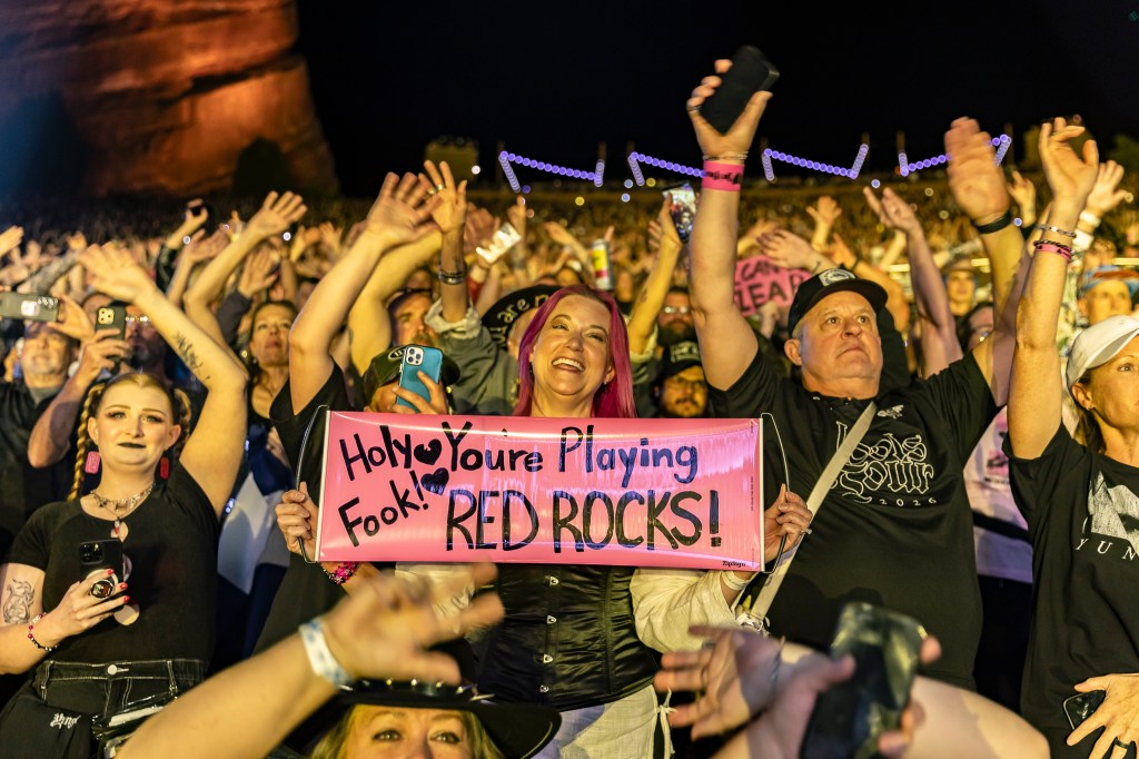 Fans packed Red Rocks with handmade signs.
