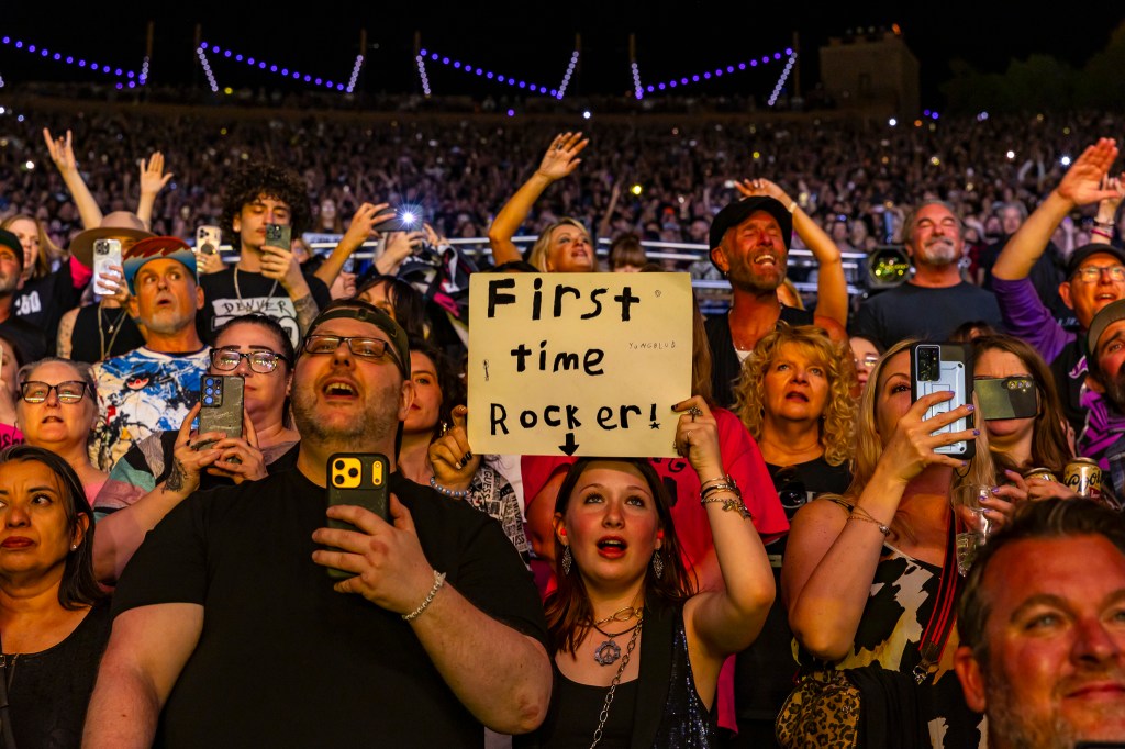 Fans packed Red Rocks with handmade signs.