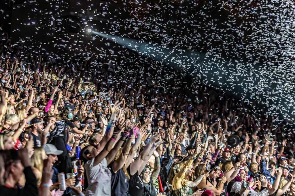 A packed Red Rocks crowd among confetti falling during Yungblud at Red Rocks Park and Amphitheater in Morrison, Colorado, on May 11.