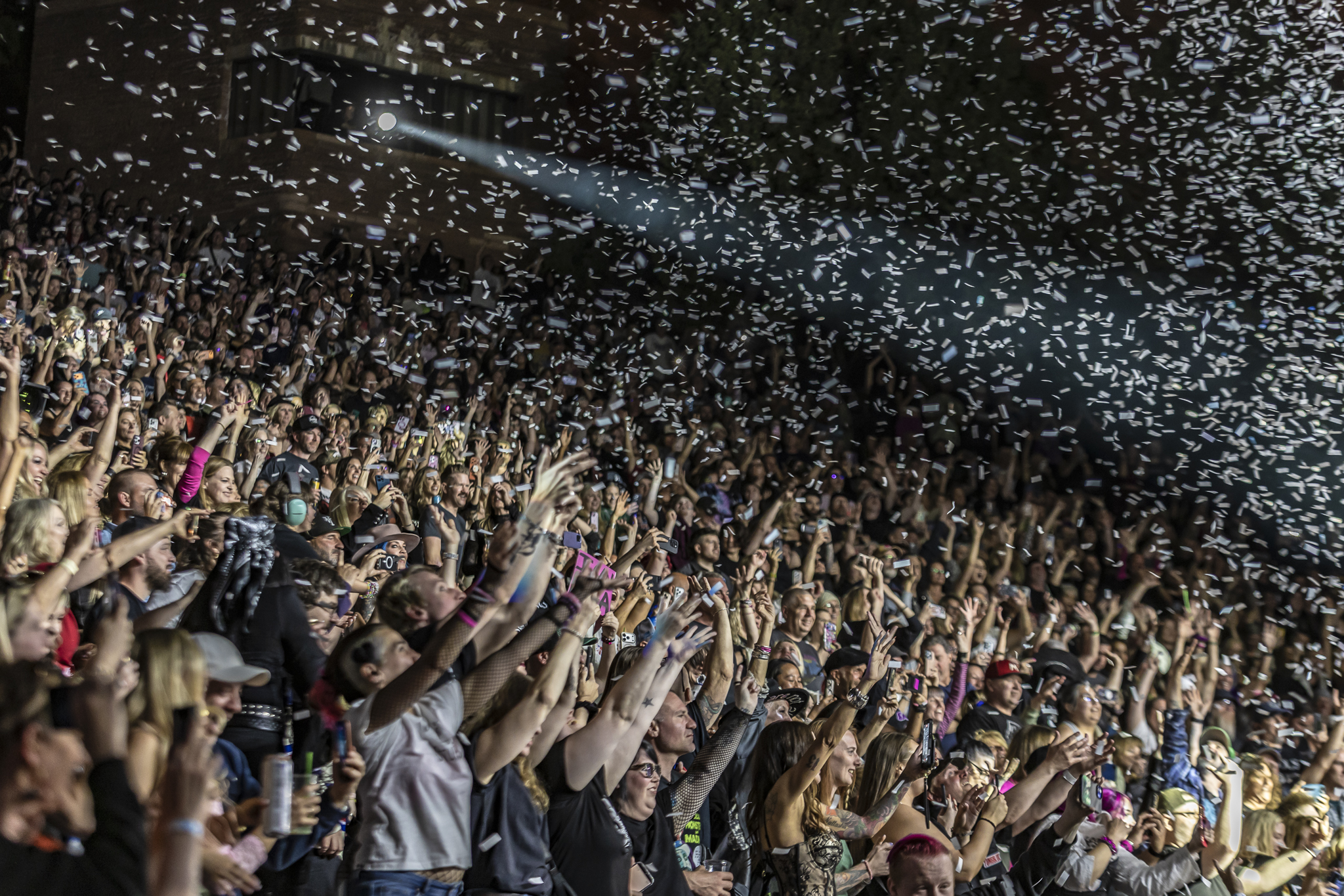 A packed Red Rocks crowd among confetti falling for Yungblud at Red Rocks Park and Amphitheater in Morrison, Colorado, on May 11.