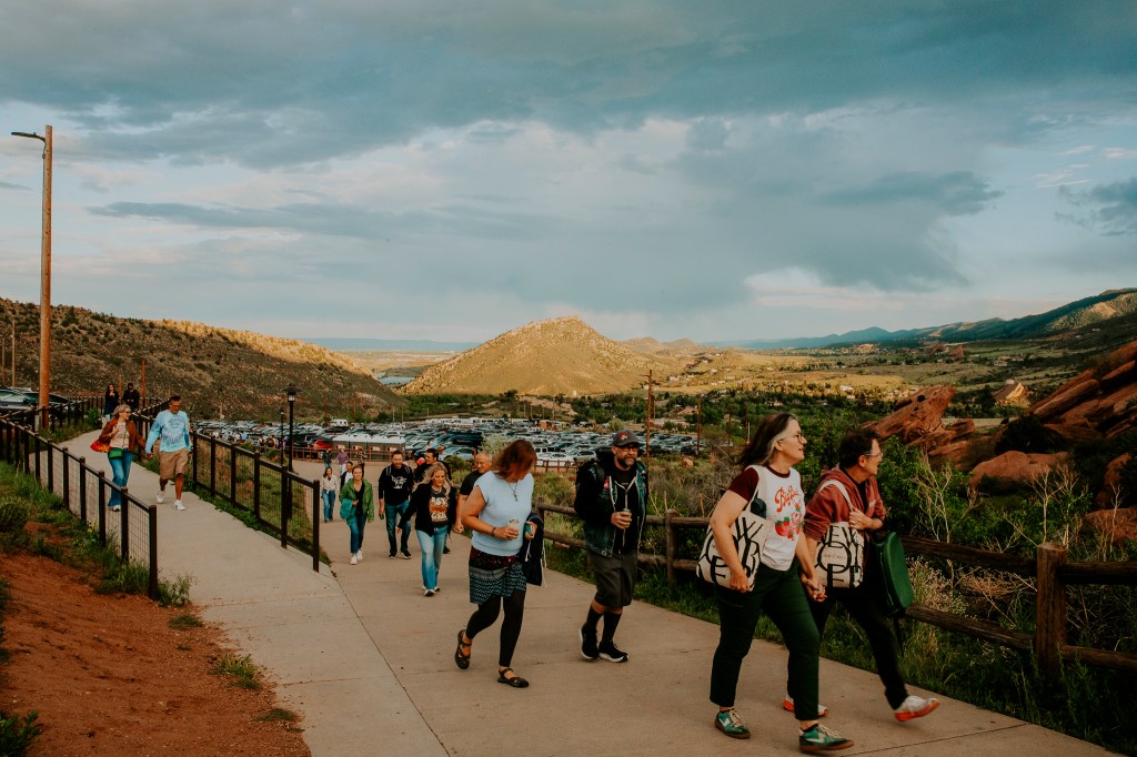 Red Rocks concertgoers walking from the parking lot to the venue.