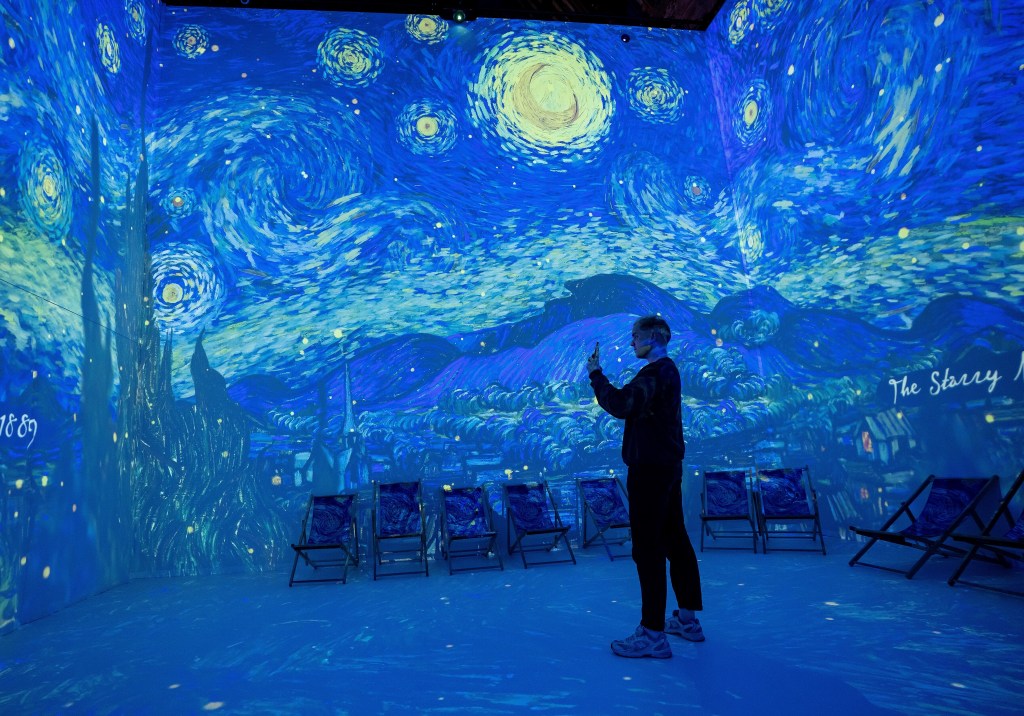 A person at Van Gogh Immersive Experience