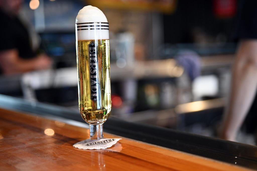 a tall glass of beer