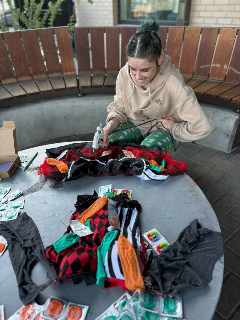 A person works on a fashion design