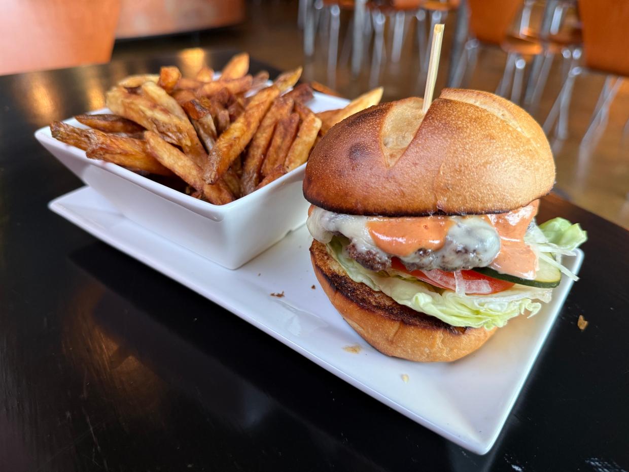 a burger with fries