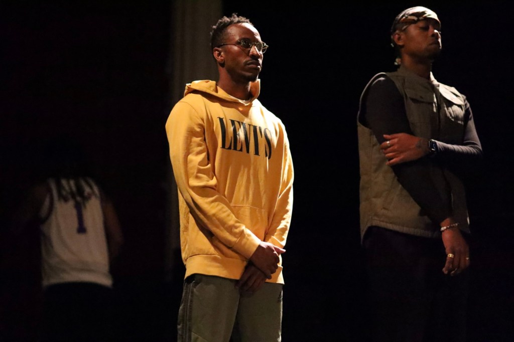 Two actors rehearse a scene