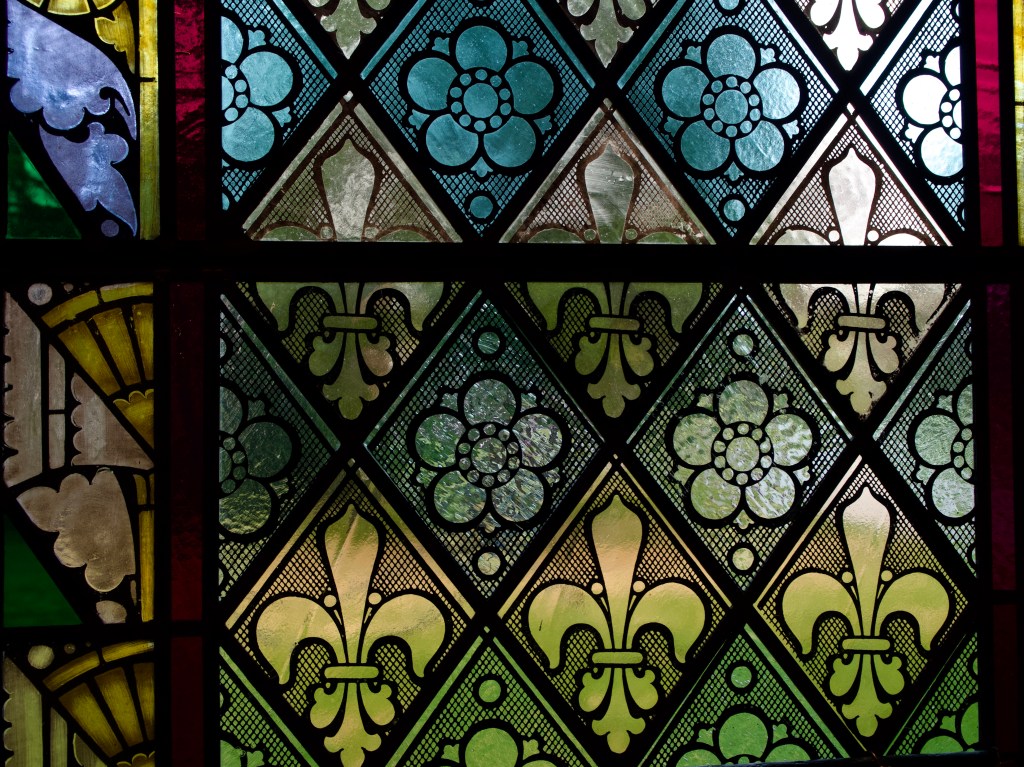 Detail of a window restored by Watkins Stained Glass at Evans Memorial Chapel.