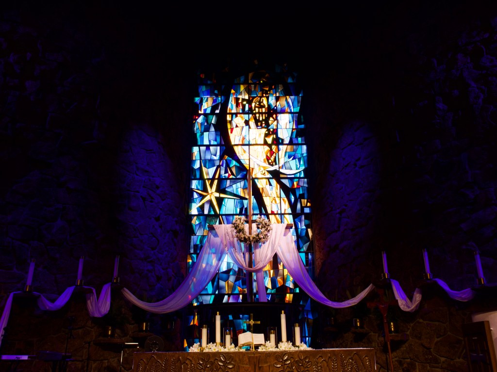 A stained glass window in a church