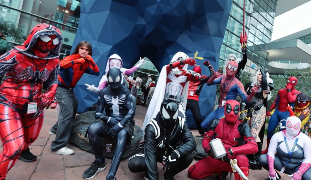 A smattering of Spideys, plus one Deadpool who crashed the photo.