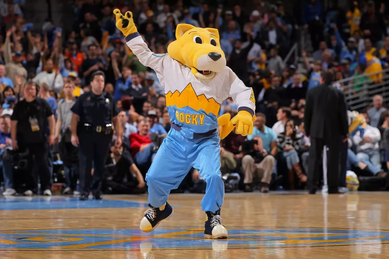 Denver nuggets mascot Rocky excites the crowd during a game