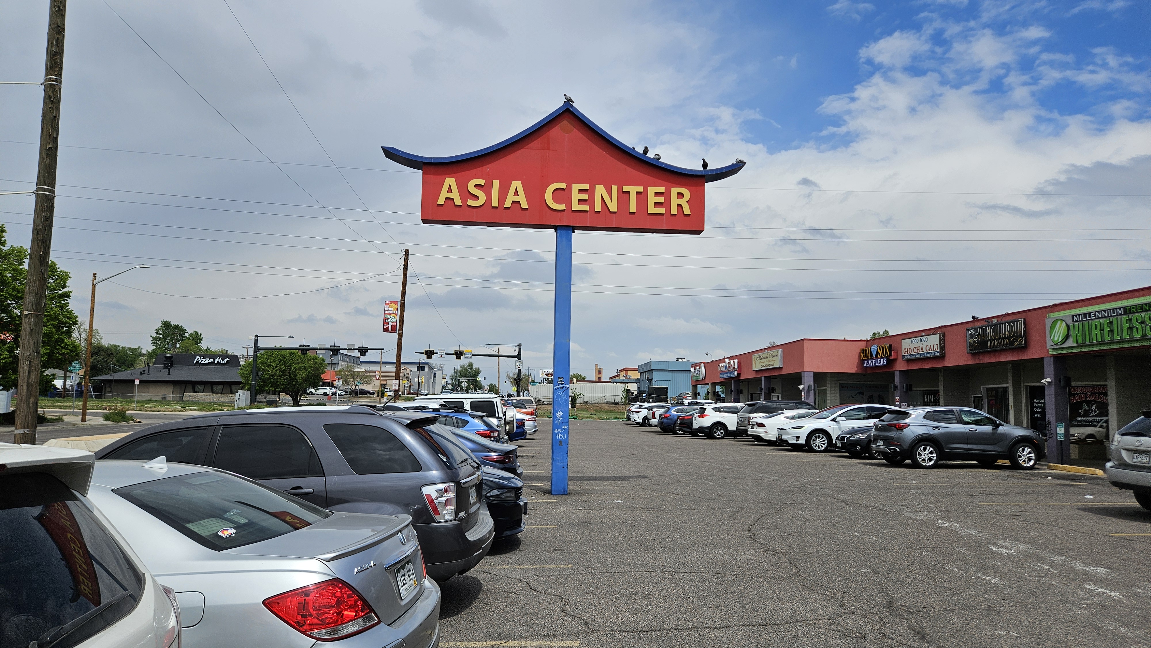 asia center sign over strip mall