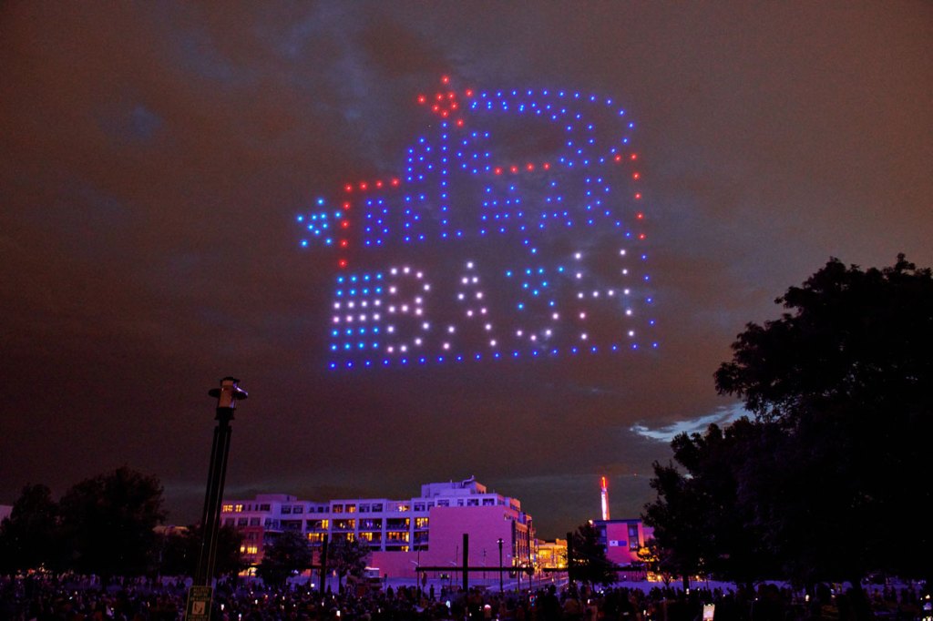 A drone show reading "Belmar Bash"