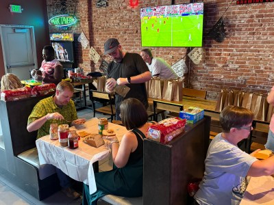 Nomadic church shifts communion to beer, PB&Js