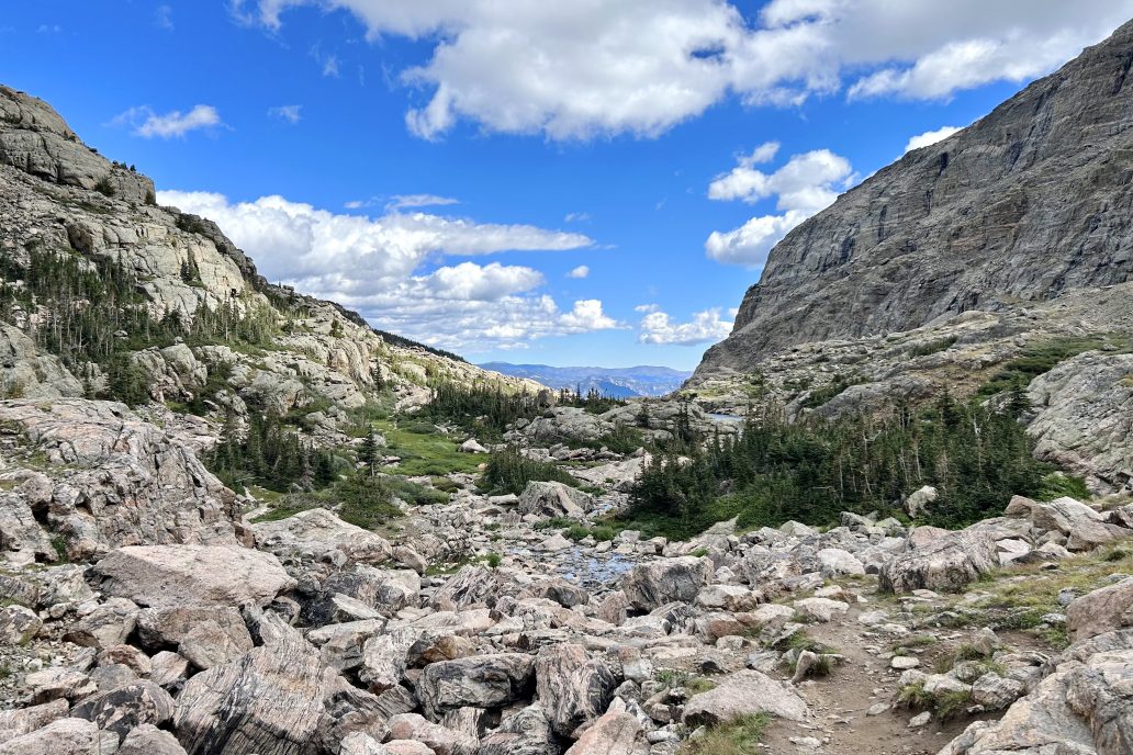 A boulder-strewn valley seen from the Sky Pond trail in Rocky Mountain National Park
