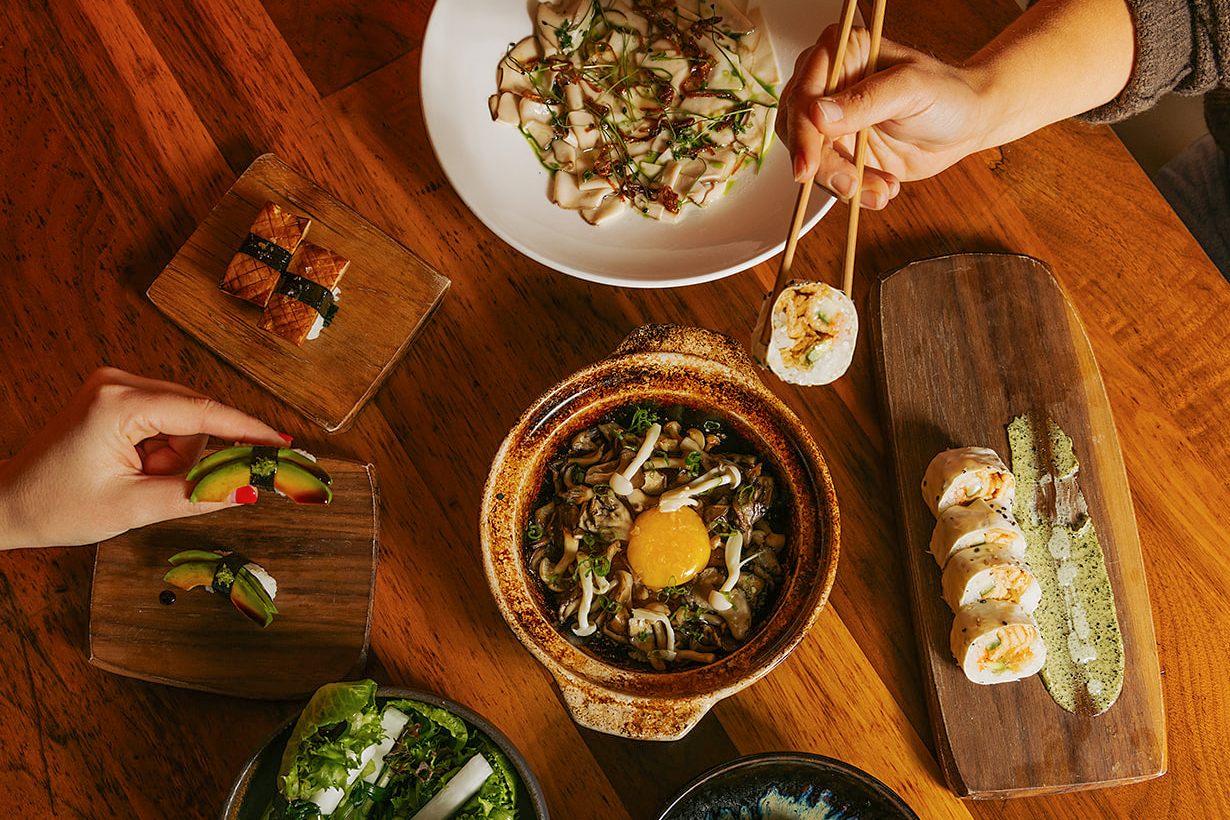 An overhead shot of sushi and other Japanese dishes from Uchi