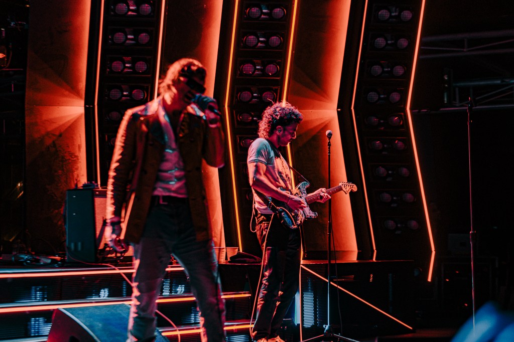 A photo of The Strokes performing live at Red Rocks on July 22.