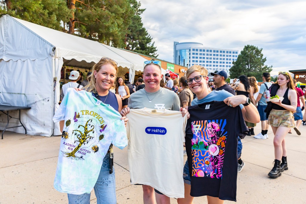 Fiddler's Green Amphitheater concertgoers with Rainbow Kitten Surprise merch and t-shirts.