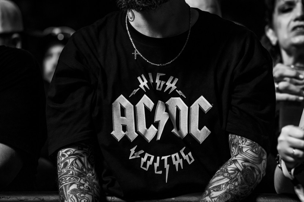 A concertgoer wearing AC/DC merch during their performance at Empower Field at Mile High on July 28.