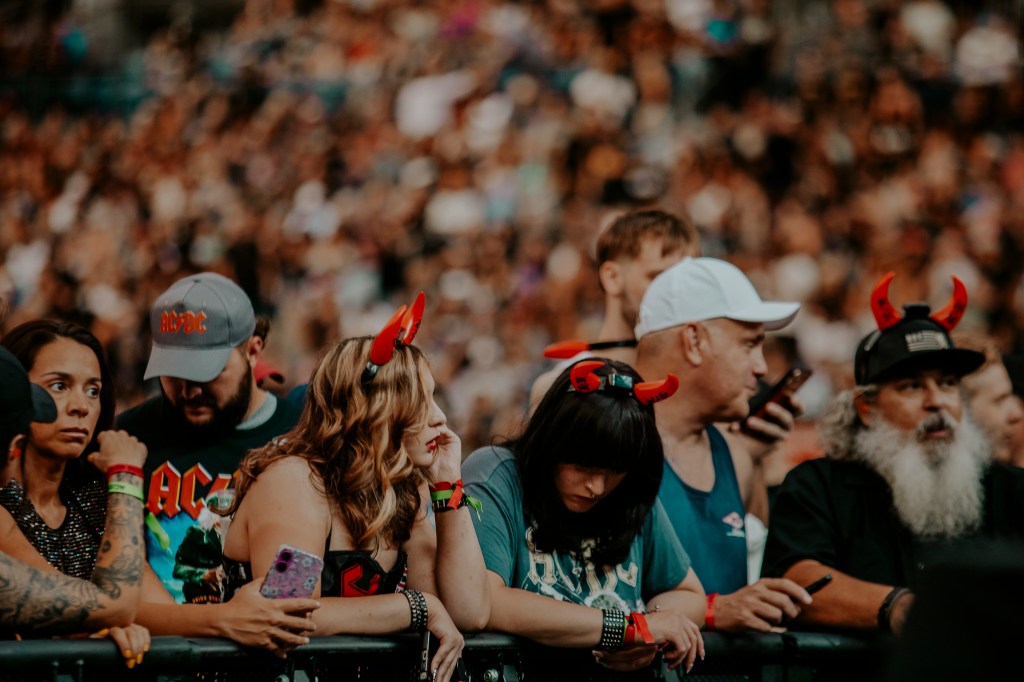 Concertgoers at the Empower Field at Mile High before AC/DC takes the stage.